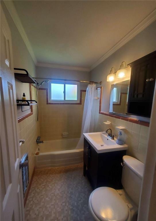 bathroom with toilet, shower / tub combo with curtain, ornamental molding, tile walls, and vanity