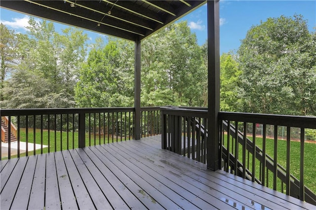 1105 Sterling Brooke Dr, Alpharetta, GA 30022 - wooden deck featuring a lawn, view of wooded area, and stairs
