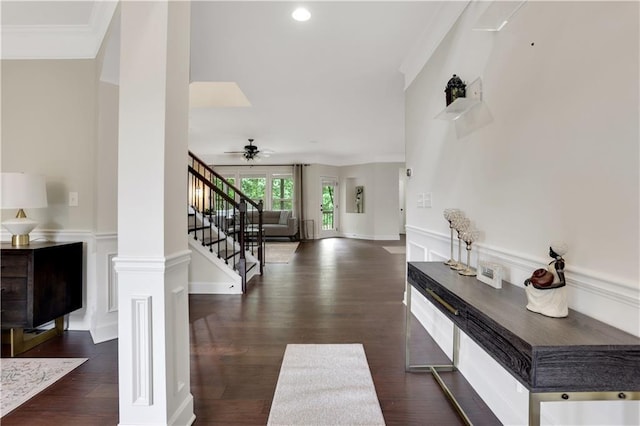1105 Sterling Brooke Dr, Alpharetta, GA 30022 - entrance foyer featuring stairway, a ceiling fan, dark wood-type flooring, decorative columns, and crown molding