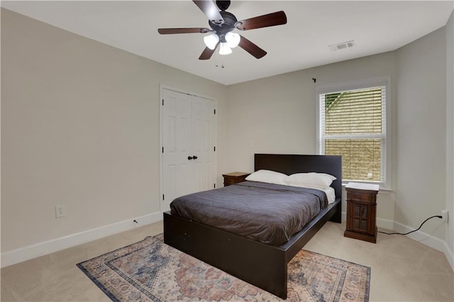 1105 Sterling Brooke Dr, Alpharetta, GA 30022 - bedroom featuring light carpet, a ceiling fan, and a closet