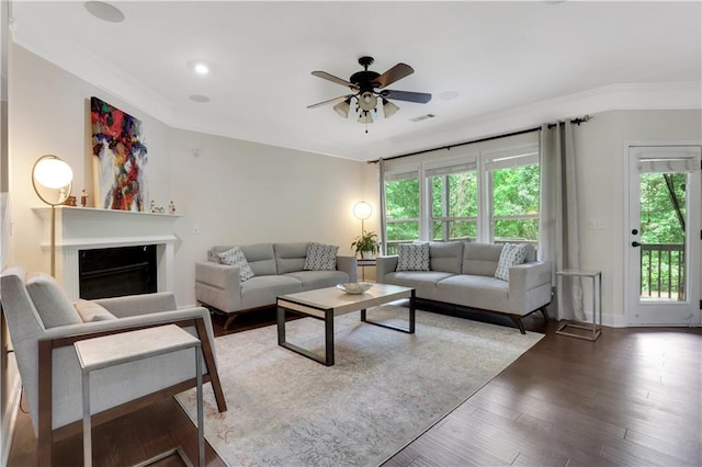 1105 Sterling Brooke Dr, Alpharetta, GA 30022 - living room featuring ornamental molding, ceiling fan, and wood finished floors