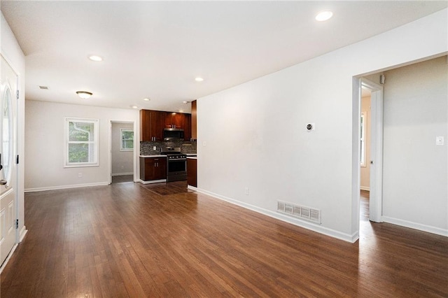 2308 Scotty Cir, Decatur, GA 30032 - unfurnished living room featuring dark wood finished floors, baseboards, and recessed lighting