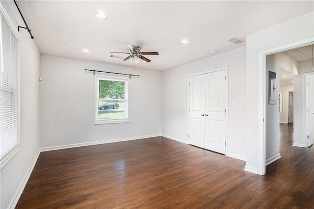 2308 Scotty Cir, Decatur, GA 30032 - unfurnished bedroom with dark wood-type flooring, baseboards, recessed lighting, a closet, and ceiling fan
