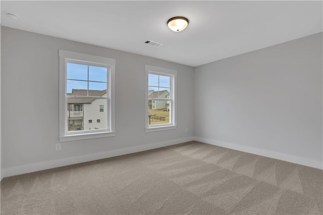 view of carpeted spare room