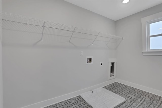 laundry area with hookup for a washing machine, gas dryer hookup, and electric dryer hookup