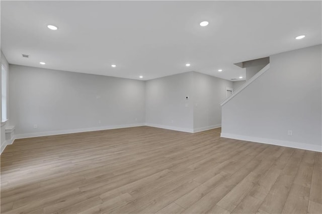 unfurnished room featuring light hardwood / wood-style floors