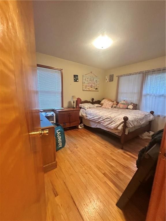 bedroom featuring light hardwood / wood-style flooring