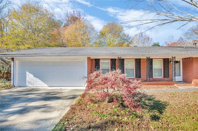 single story home with a garage