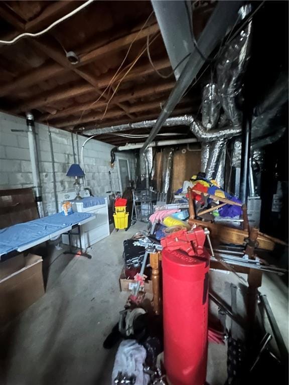 basement with washer and clothes dryer