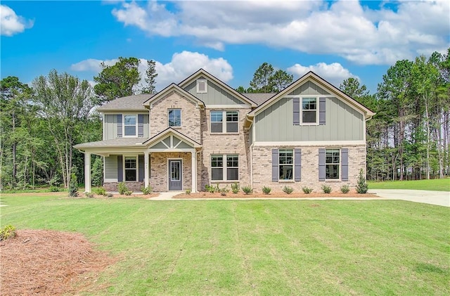 0 Cooper Cv E, Fayetteville, GA 30215 - craftsman-style house with a front yard, brick siding, and board and batten siding