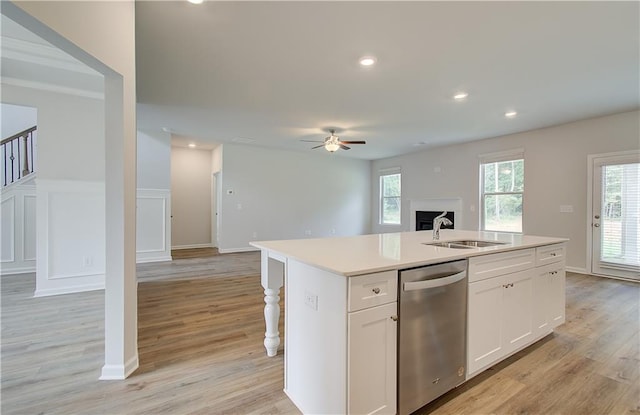 0 Cooper Cv E, Fayetteville, GA 30215 - kitchen featuring dishwasher, a sink, open floor plan, light wood finished floors, and ceiling fan