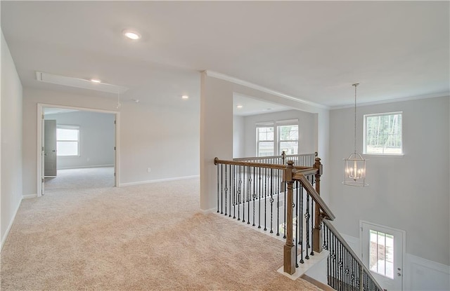 0 Cooper Cv E, Fayetteville, GA 30215 - hall featuring an upstairs landing, crown molding, carpet floors, baseboards, and recessed lighting