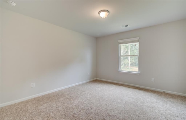 0 Cooper Cv E, Fayetteville, GA 30215 - carpeted spare room featuring baseboards and a smoke detector
