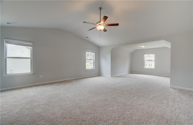 0 Cooper Cv E, Fayetteville, GA 30215 - unfurnished room featuring a ceiling fan, lofted ceiling, healthy amount of natural light, baseboards, and light colored carpet