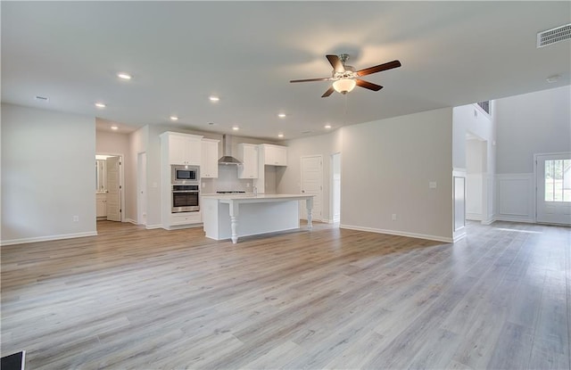 0 Cooper Cv E, Fayetteville, GA 30215 - unfurnished living room featuring ceiling fan, light wood-style flooring, recessed lighting, and baseboards