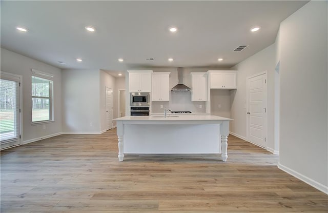 0 Cooper Cv E, Fayetteville, GA 30215 - kitchen featuring appliances with stainless steel finishes, white cabinetry, light countertops, a sink, and baseboards