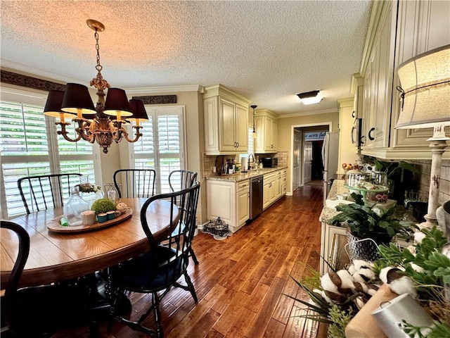 270 Owens Cir NE, Calhoun, GA 30701 - dining space featuring a chandelier, crown molding, dark wood finished floors, a textured ceiling, and a fireplace