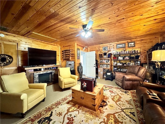 270 Owens Cir NE, Calhoun, GA 30701 - carpeted living area with wooden walls, a fireplace, ceiling fan, and wood ceiling