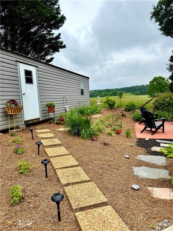 270 Owens Cir NE, Calhoun, GA 30701 - view of yard featuring an outbuilding