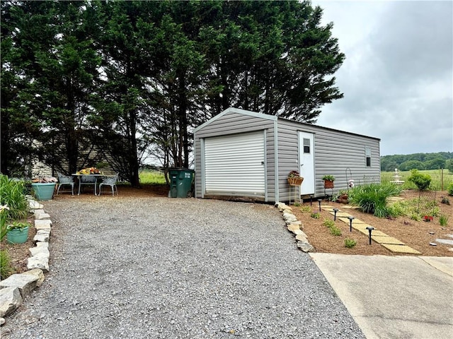 270 Owens Cir NE, Calhoun, GA 30701 - garage featuring driveway