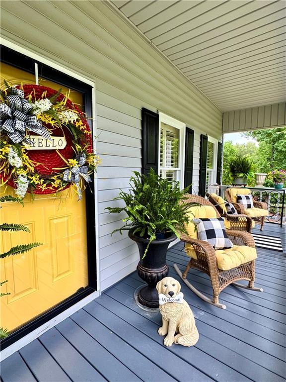 270 Owens Cir NE, Calhoun, GA 30701 - wooden deck featuring a porch