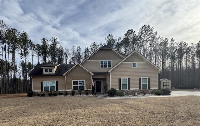 96 Carlow Ct, Newnan, GA 30263 - craftsman inspired home featuring a front yard and stone siding