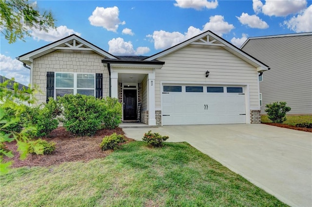 82 Graham Campbell Ln, Statham, GA 30666 - view of front of home featuring a garage and driveway