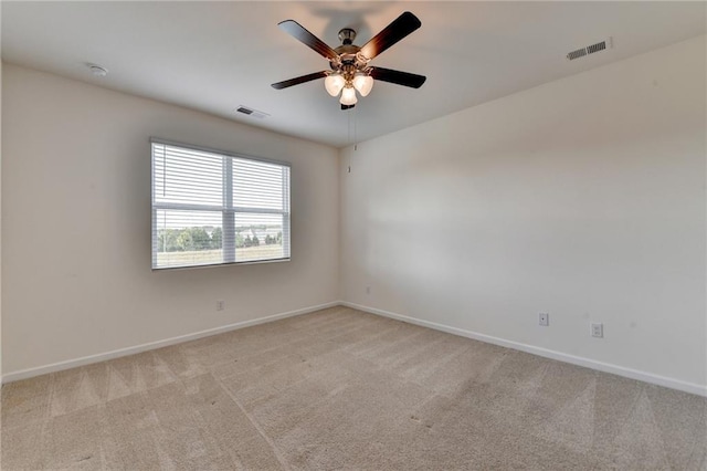 82 Graham Campbell Ln, Statham, GA 30666 - empty room with a ceiling fan, light carpet, baseboards, and a smoke detector