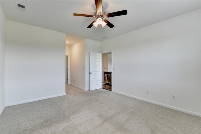 82 Graham Campbell Ln, Statham, GA 30666 - spare room with light colored carpet, baseboards, ceiling fan, and recessed lighting