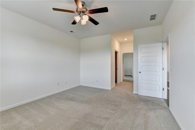 82 Graham Campbell Ln, Statham, GA 30666 - spare room with light colored carpet, ceiling fan, and baseboards