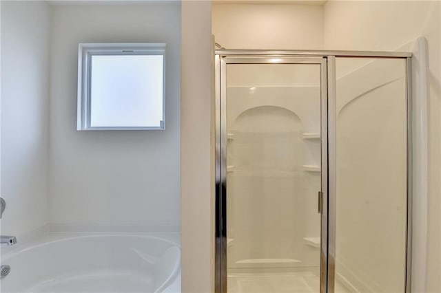 82 Graham Campbell Ln, Statham, GA 30666 - bathroom with a stall shower and a bath