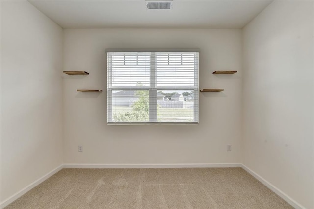 82 Graham Campbell Ln, Statham, GA 30666 - spare room featuring light colored carpet and baseboards