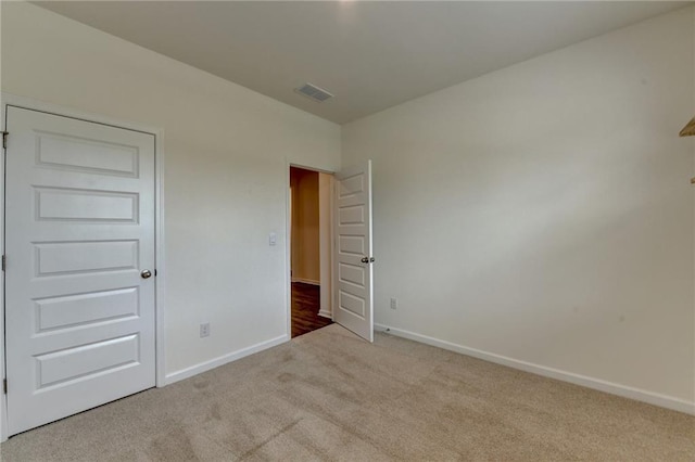 82 Graham Campbell Ln, Statham, GA 30666 - unfurnished bedroom featuring carpet floors and baseboards