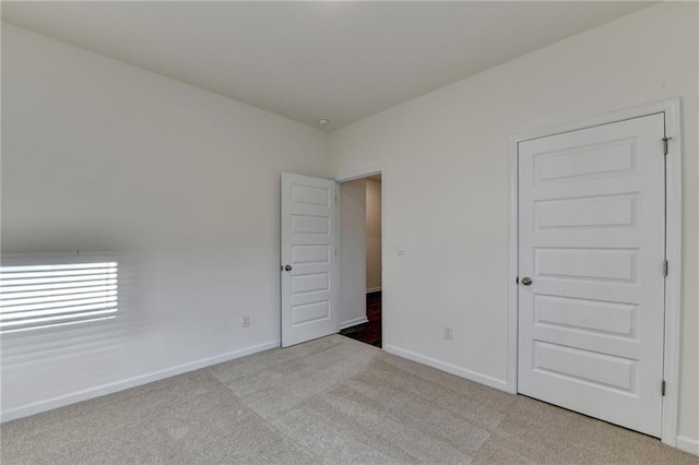 82 Graham Campbell Ln, Statham, GA 30666 - unfurnished room with light carpet and baseboards