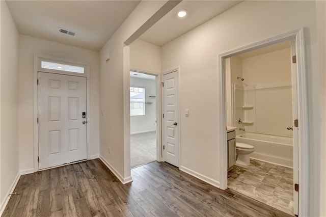 82 Graham Campbell Ln, Statham, GA 30666 - entryway featuring dark wood-style floors and baseboards
