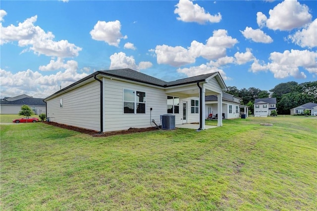 82 Graham Campbell Ln, Statham, GA 30666 - rear view of property featuring a yard, a patio, and central air condition unit