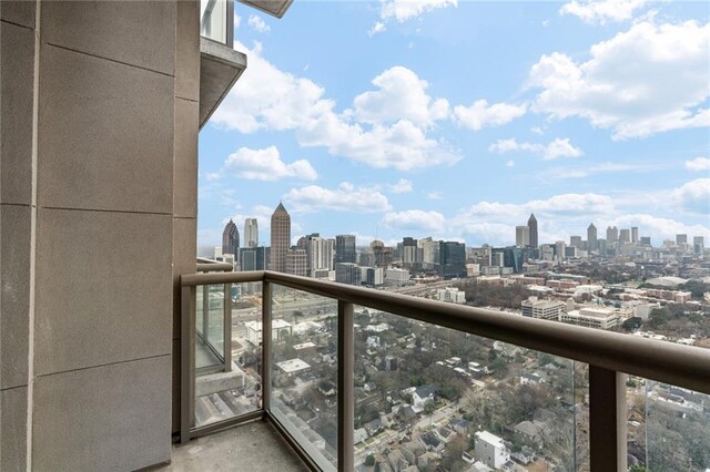 balcony featuring a city view