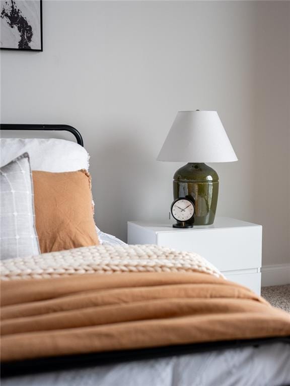bedroom featuring baseboards