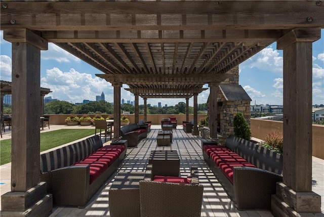 view of patio / terrace with outdoor lounge area and a pergola