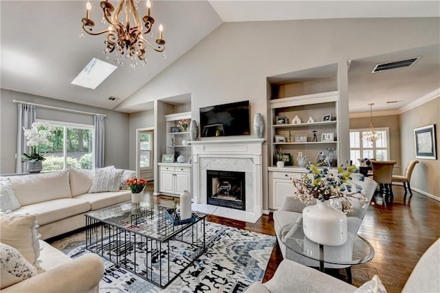 510 Elgaen Ct, Roswell, GA 30075 - living room featuring a chandelier, a fireplace, built in features, dark wood finished floors, and high vaulted ceiling