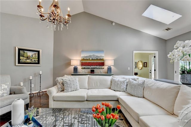 510 Elgaen Ct, Roswell, GA 30075 - living area featuring vaulted ceiling, a chandelier, wood finished floors, and a skylight