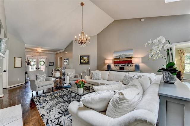 510 Elgaen Ct, Roswell, GA 30075 - living area featuring plenty of natural light, a chandelier, dark wood-type flooring, high vaulted ceiling, and french doors