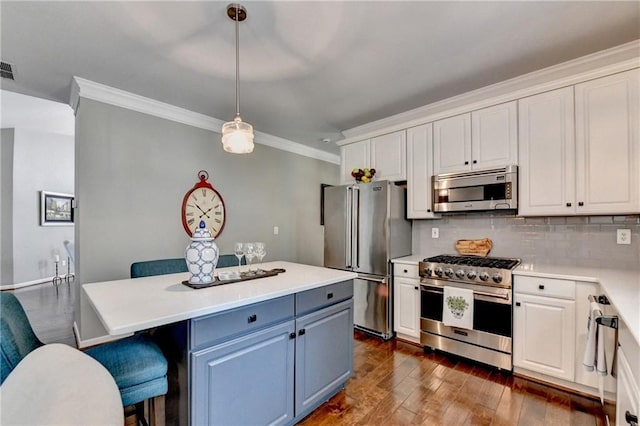 510 Elgaen Ct, Roswell, GA 30075 - kitchen featuring high quality appliances, crown molding, white cabinetry, light countertops, and backsplash