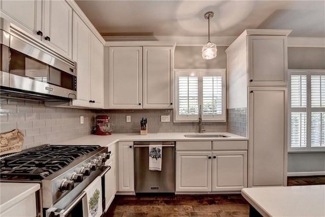 510 Elgaen Ct, Roswell, GA 30075 - kitchen featuring stainless steel appliances, light countertops, healthy amount of natural light, and white cabinets