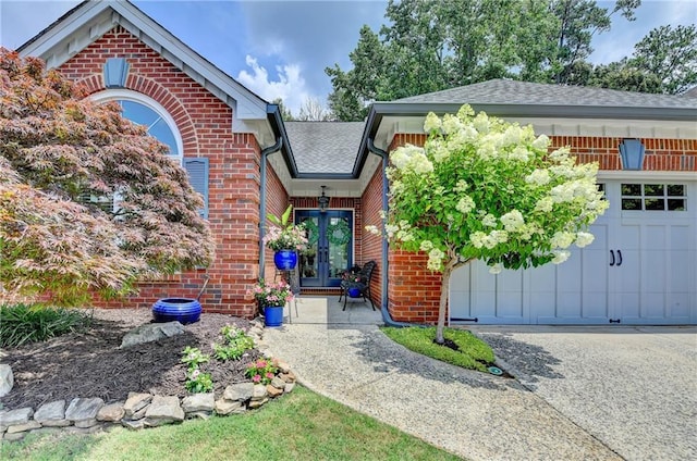 510 Elgaen Ct, Roswell, GA 30075 - view of front of house featuring french doors, brick siding, roof with shingles, and a garage