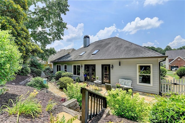 510 Elgaen Ct, Roswell, GA 30075 - back of house with a chimney, a patio, and a shingled roof