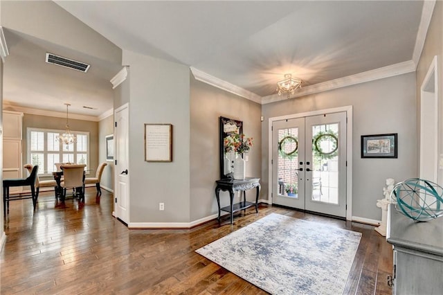 510 Elgaen Ct, Roswell, GA 30075 - foyer with a chandelier, french doors, dark wood-type flooring, and crown molding