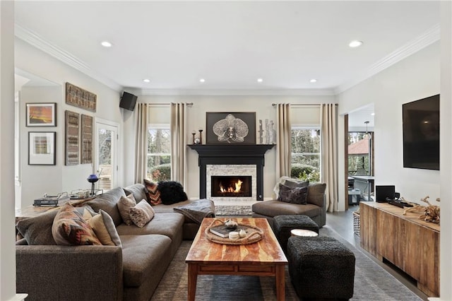 living room with ornamental molding and hardwood / wood-style floors