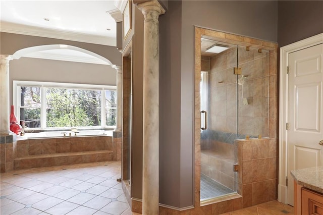 bathroom with crown molding, tile flooring, decorative columns, and independent shower and bath