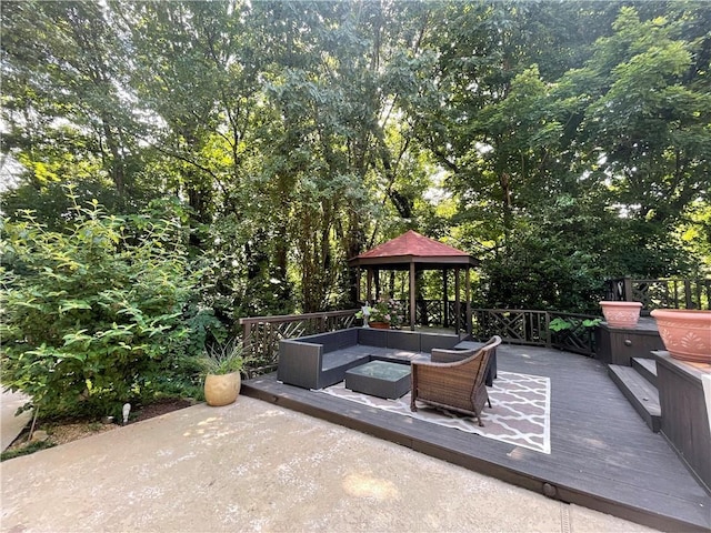 view of patio featuring outdoor lounge area and a gazebo